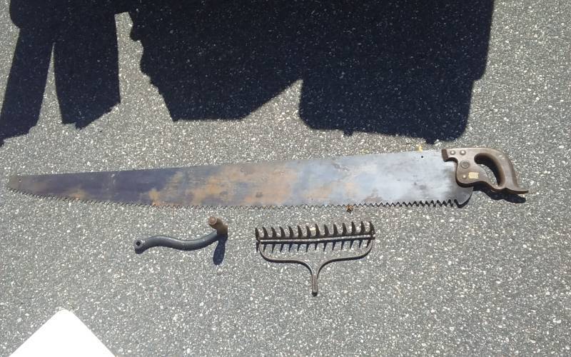 lot 102 image: Large Old Saw, Rake Head, Crank Handle