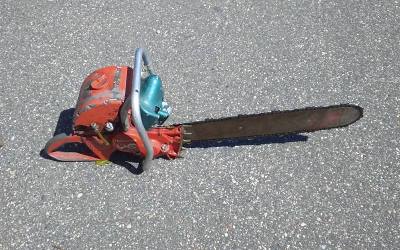 lot 103 image: Vintage Homelite Chain Saw