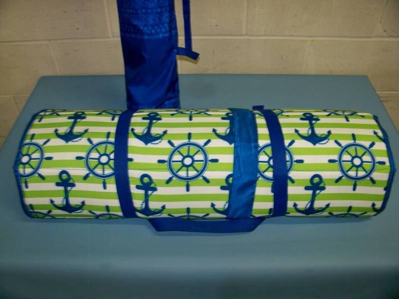 lot 27 image: Tommy Bahama, Beach Umbrella in Carrying Case and Novaform Beach Mat with Pillow