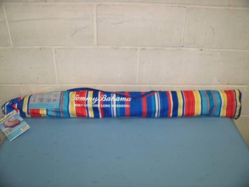 lot 28 image: Tommy Bahama, Beach Umbrella in Carrying Case