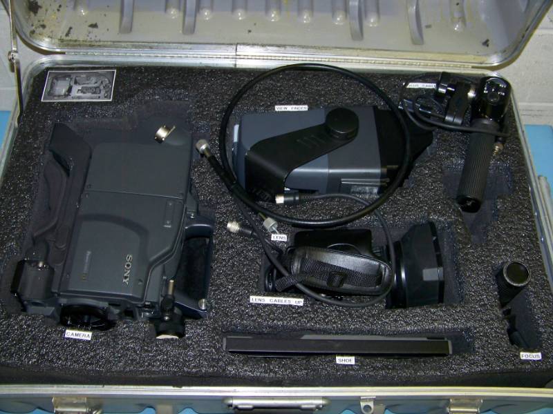 lot 94 image: Sony, Digital Video Camera and Accessories in Hard-Sided, Padded Inside, Shok-Stop Travel Case