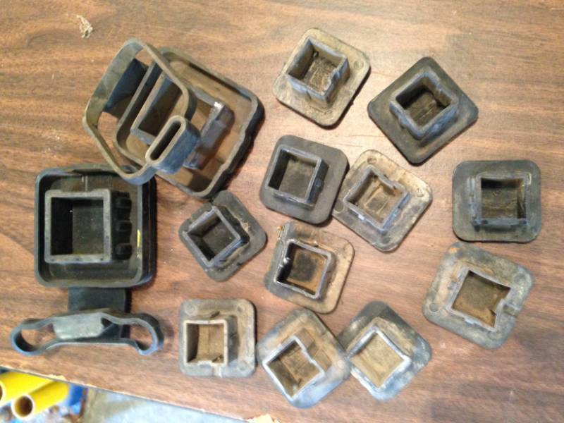 lot 12 image: 13 hitch receiver covers (GM, Subaru, Kia)