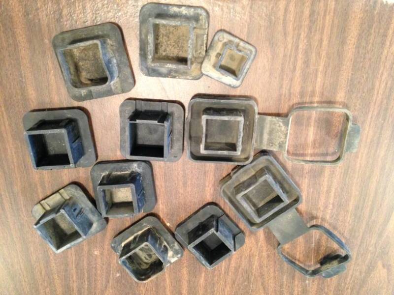 lot 15 image: 11 Hitch receiver covers (GM, Reese, Towsmart)