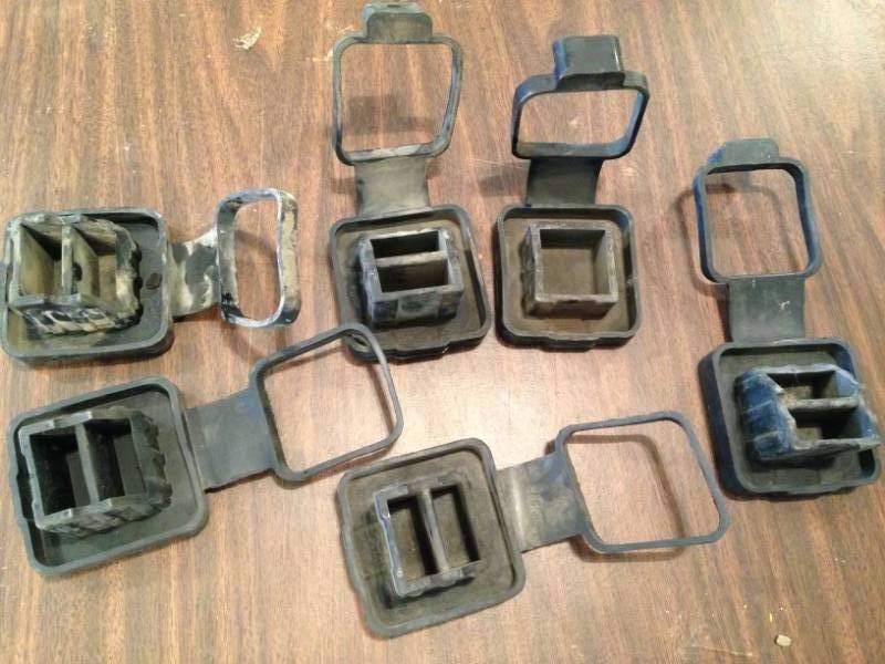 lot 27 image: 6 Hitch receiver covers (Jeep)