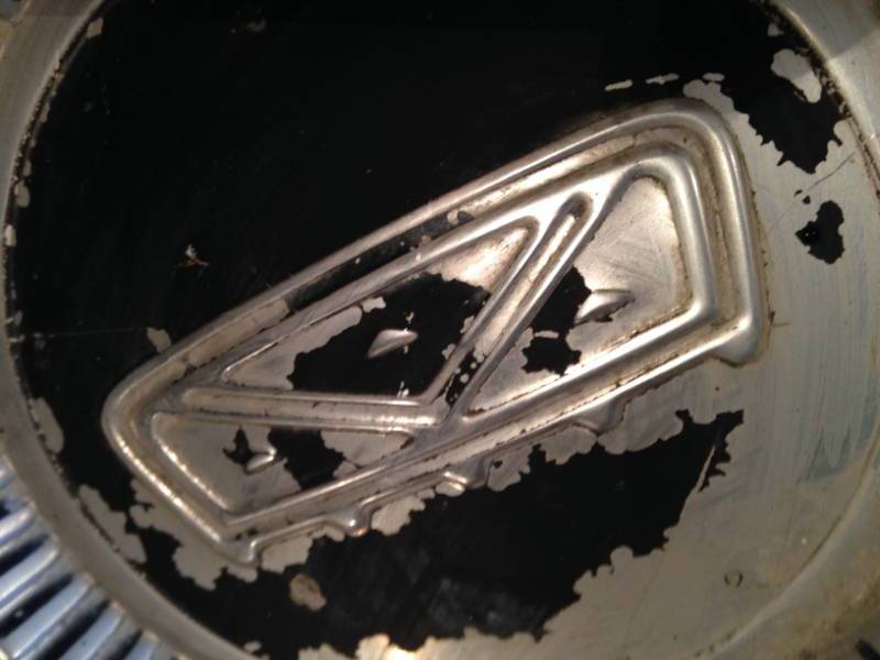 lot 30 image: 4 Hubcap wheel covers (Chevy, Ford)