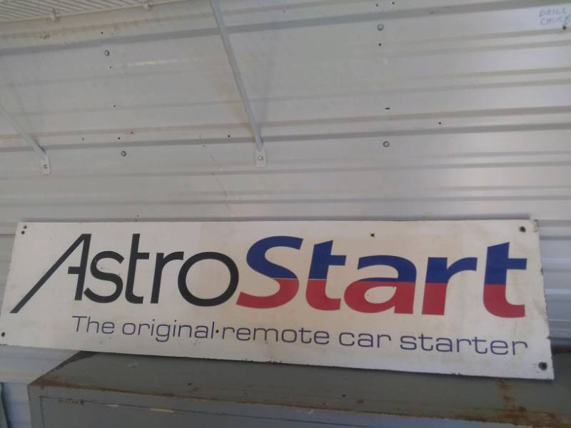 lot 60 image: Auto Shop signs (AstroStart, Interstate Batteries)