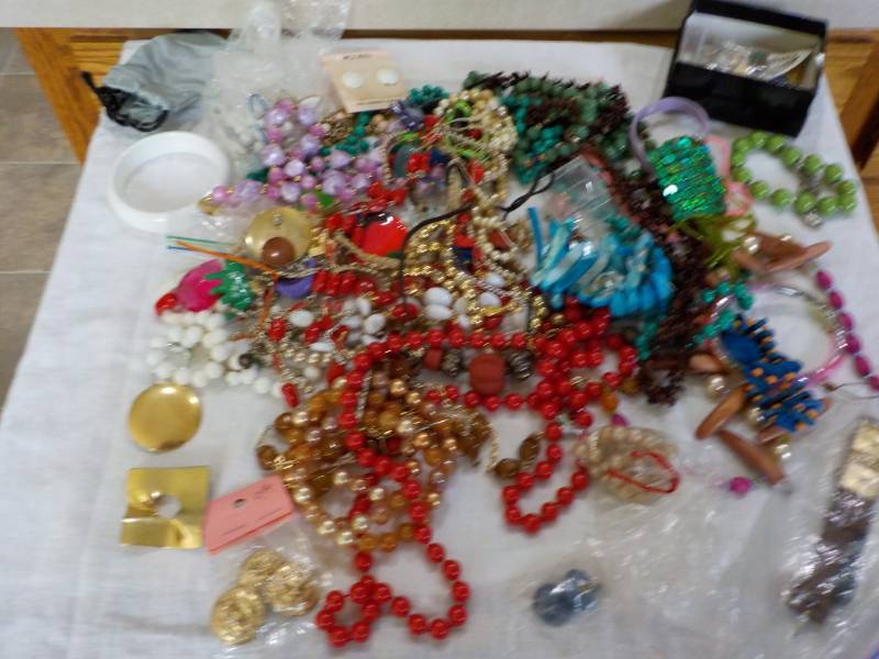 lot 16 image: All Jewelry pictured and a carved J...