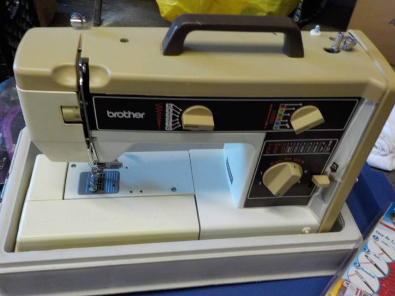 lot 23 image: Brother Sewing Machine in case and ...