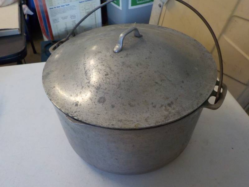 lot 92 image: Cast Iron Kettle and Lid...