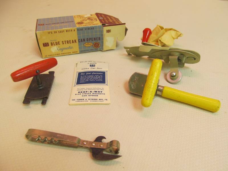 lot 9 image: vintage bottle , can openers