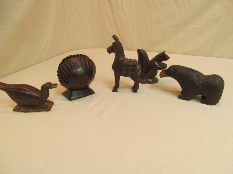 lot 71 image: iron wood statues