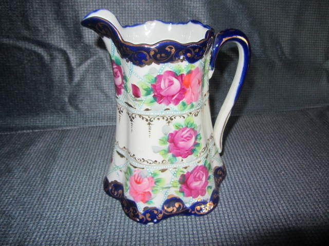 lot 26 image: Cobalt Edged Pitcher