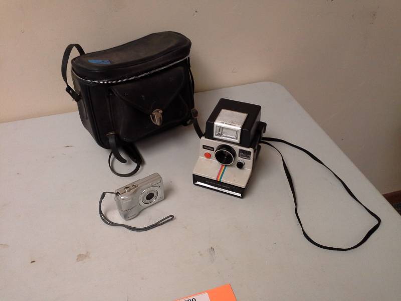lot 109 image: Polaroid One Step ITT Magicflash Land Camera, Olypus FE-170 6.0Mpixel Digital Point and Shoot Camera, Camera Bag