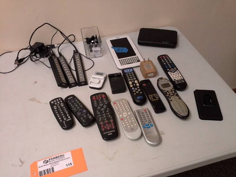 lot 115 image: Remote Controls, USB Power Strips, Power Cords, DirectTV MDR1R0-01, International Power Cord Adapters, Literati e-Reader, The Sharper Image Portable HDD