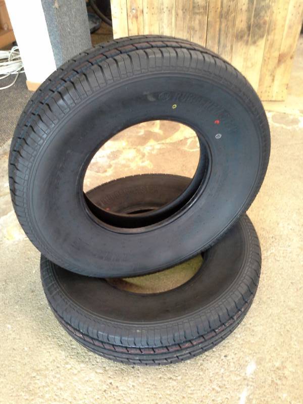 lot 988 image: Lot of (2) New Rubbermaster ST23585R16 Tires