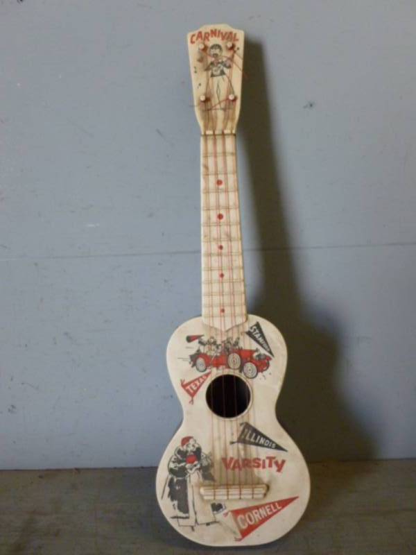 lot 115 image: Vintage Kids Guitar