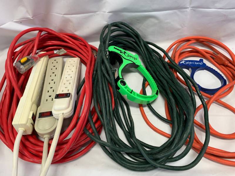 lot 64 image: Lot of 3 Extension Cords, Outlet Strips, Clamps