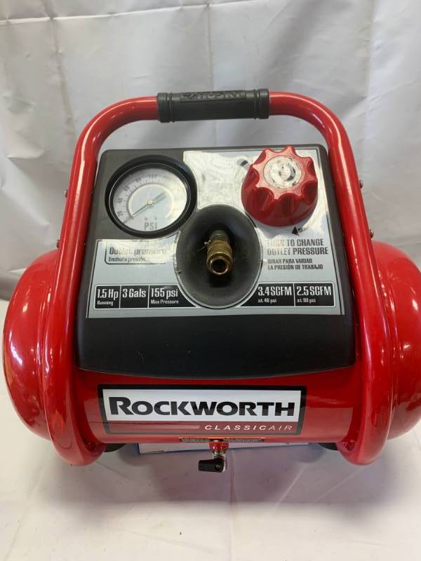 lot 84 image: New Rockworth 1.5 Gallon Air Compressor w Accessories