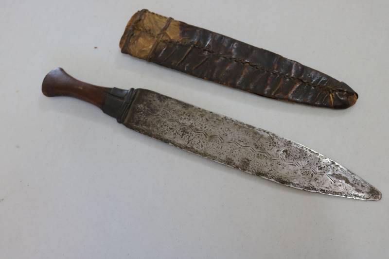 lot 341 image: Very old knife with ornate markings...