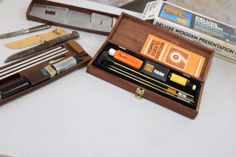 lot 342 image: 2 gun cleaning kits and 2 knives...