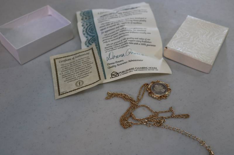 lot 348 image: 1916 Dime necklace...