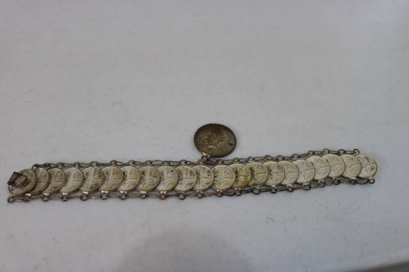 lot 373 image: Bracelet of 1952 coins with 1944 fe...