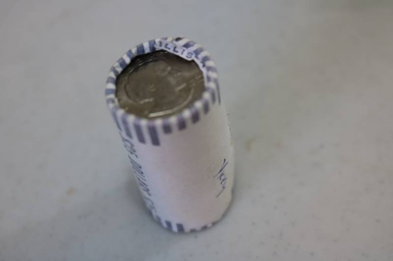 lot 377 image: Roll of 25 Susan B Anthony dollars...