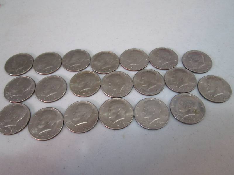 lot 407 image: $10.00 1973 hald dollars...