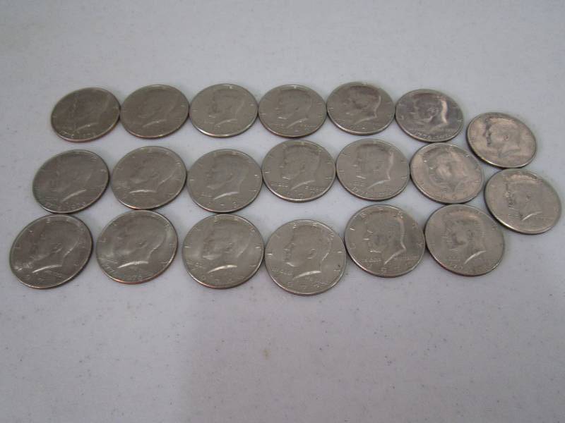 lot 412 image: $10.00 in Kennedy half dollars...