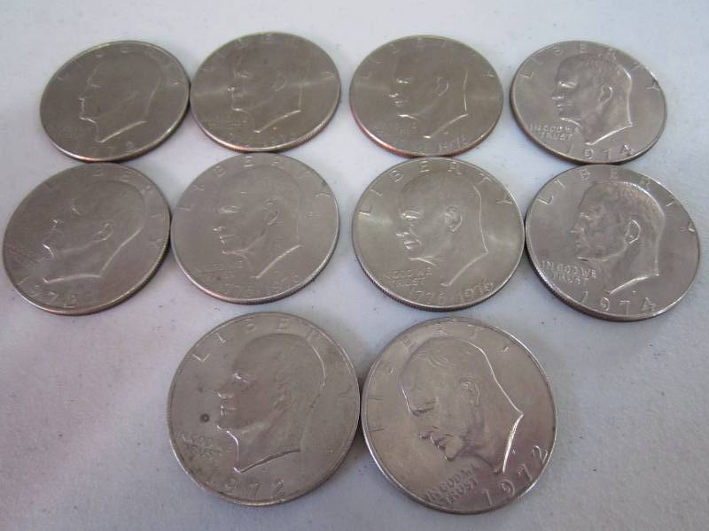 lot 421 image: 10 Dollar coins...