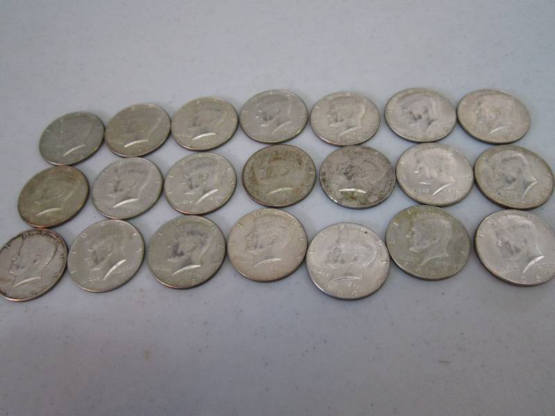 lot 423 image: 1960s half dollars...