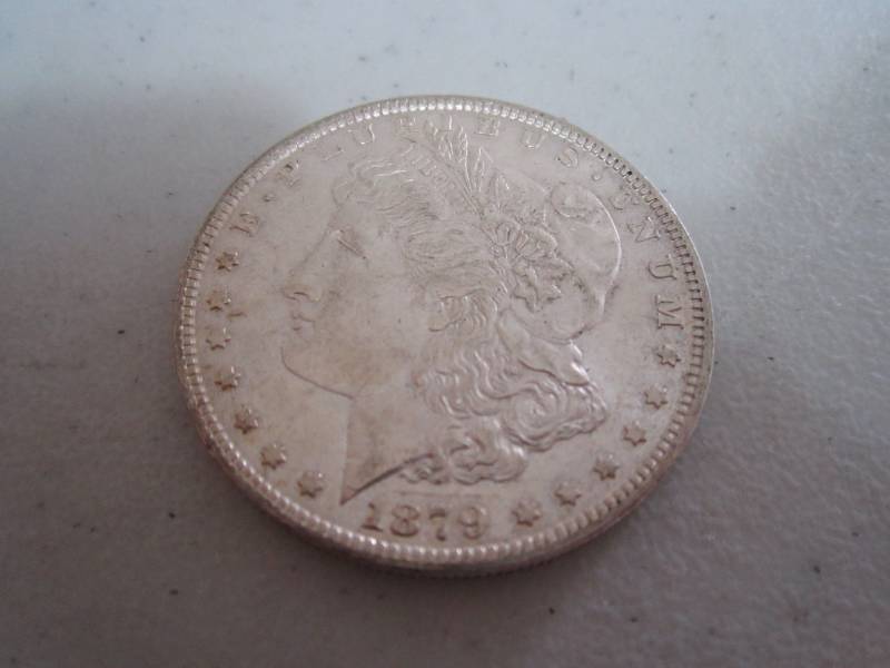 lot 438 image: 1879 Silver Dollar...