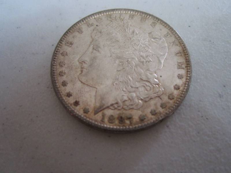 lot 441 image: 1897 Silver Dollar...