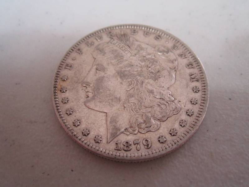 lot 442 image: 1879 Silver Dollar...