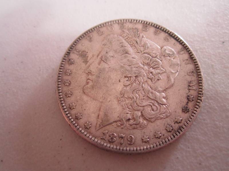 lot 443 image: 1879 Silver Dollar...