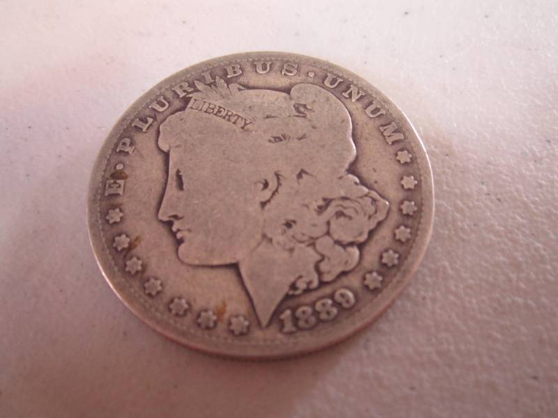 lot 444 image: 1889 O Silver dollar...