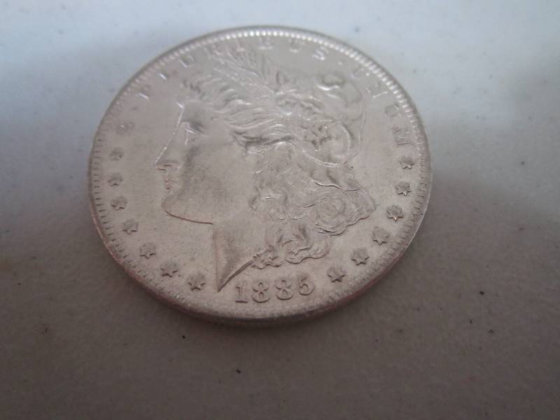 lot 446 image: 1885 ) Silver dollar...