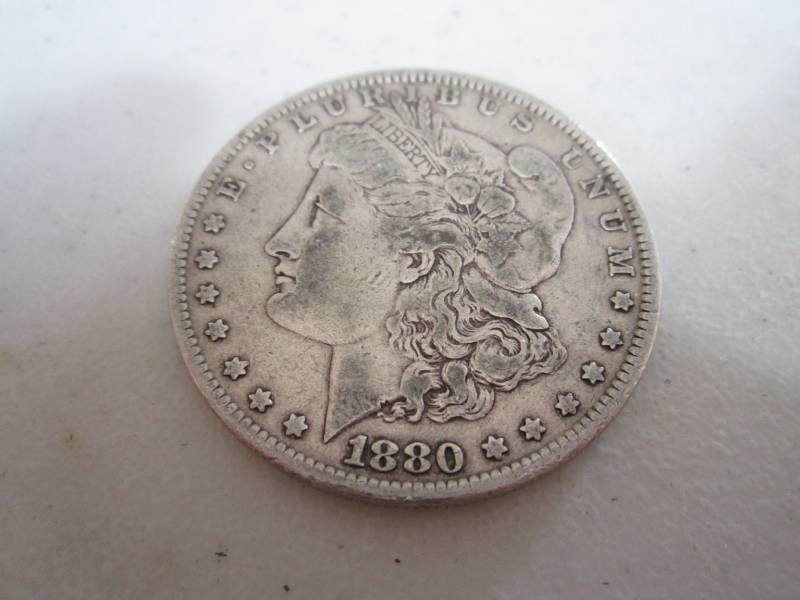 lot 447 image: 1880 Silver Dollar...