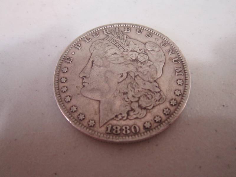 lot 450 image: 1880 Silver Dollar...