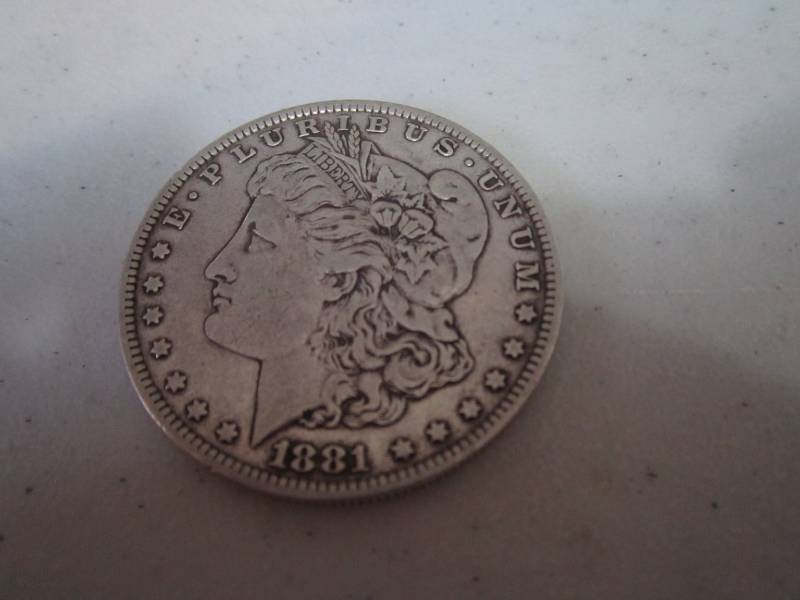 lot 452 image: 1881 O Silver Dollar...