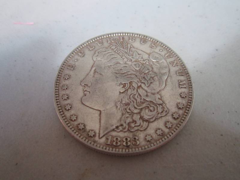 lot 458 image: 1883 Silver Dollar...