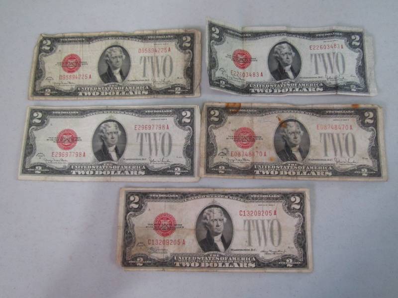 lot 151 image: 1928 $2.00 bills...