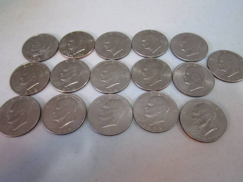 lot 164 image: 16 1970s Dollars...