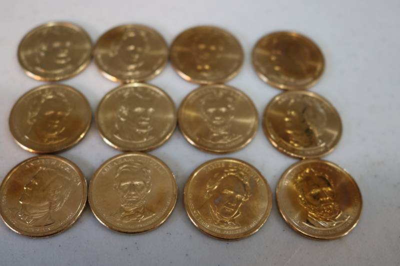 lot 182 image: 12 Golden Dollar coins- uncirculate...