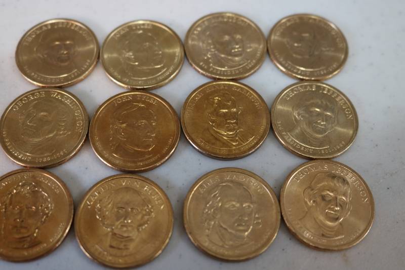 lot 187 image: 12 Golden Dollar coins- uncirculate...