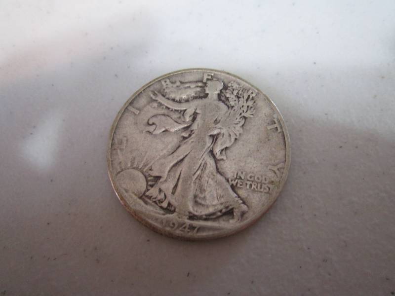 lot 224 image: 1947 half dollar...