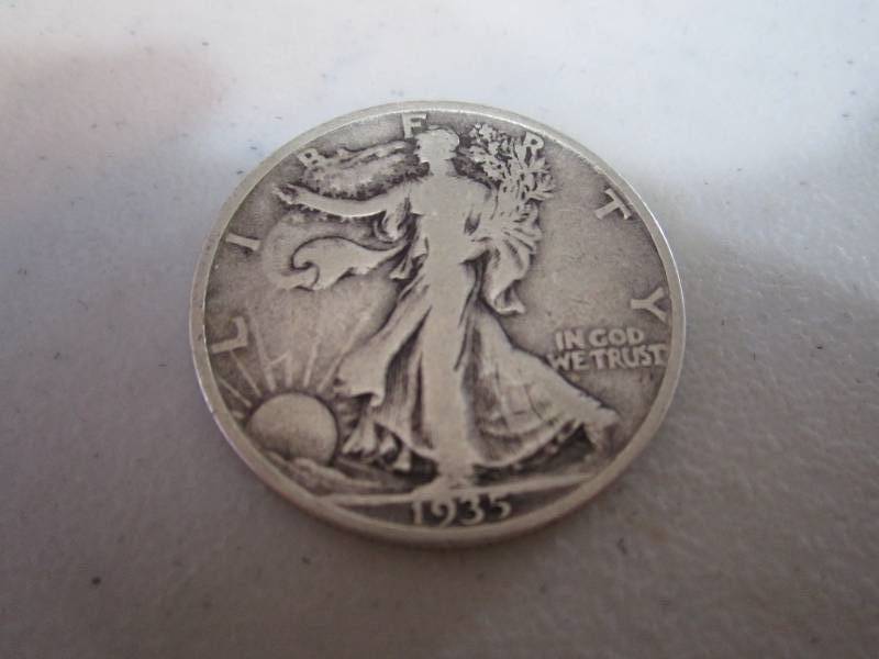 lot 228 image: 1935 half dollar...