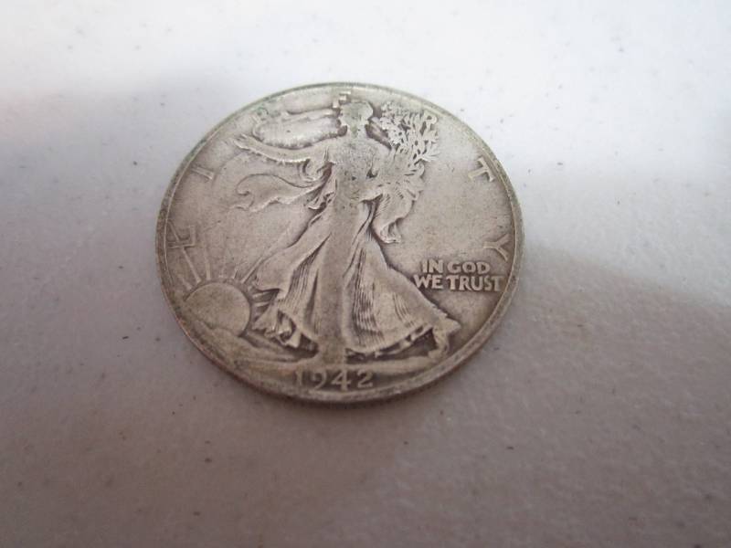 lot 233 image: 1942 S half dollar...