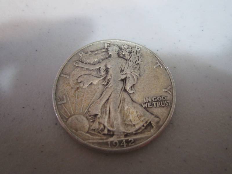 lot 234 image: 1942 half dollar...
