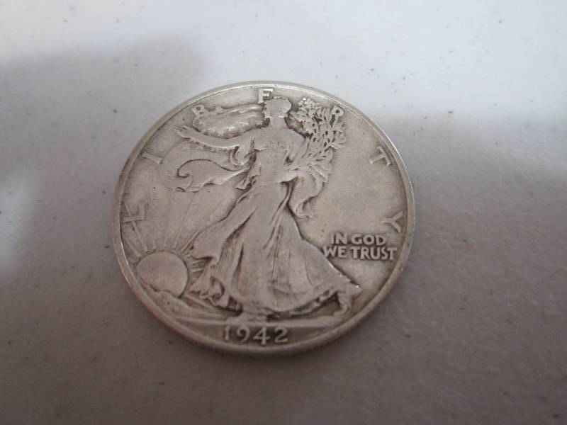 lot 240 image: 1942 S half dollar...